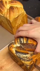 Stuffed Milk Toast Bread 🍞 dough preparation in the mixer bowl bread flour 520g sugar 25g milk powder 30g instant yeast 9g two large eggs milk 260g knead the dough for 7min butter 40g salt 6g knead the dough for 5min cover the dough rest the dough for 60min separate the dough into two pieces make balls cover the dough rest the dough for 15min make the bread black sesame filling take a bowl 20g butter 10g sugar 15g eggs mix well 20g milk powder 50g black sesame powder mix well soybean filling ta