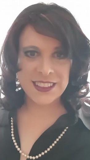 elegant crossdresser in black satin blouse and pencil skirt - Christina d`Yvon