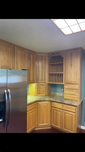 From dark natural pecan cabinets to fresh white this kitchen is ready for a party. | Dependable Painting Co.