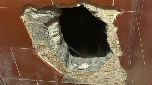 Photos | Fulton inmate digs through jail wall, attacks neighboring inmate