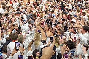 Nothing says “woo pig sooie” like Eric Musselman partying shirtless with court stormers after taking down no. 1 Auburn
