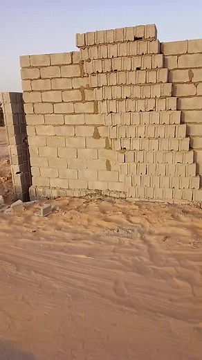 Construction of a Brick Wall: Step-by-Step Process