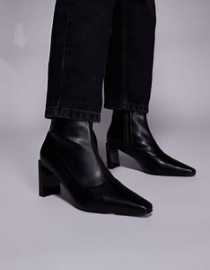 Public Desire Robert Wide Fit heeled ankle boots in black | ASOS