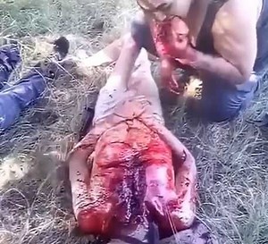 Gore video - CJNG member ate his victim raw - XGore - Extreme Gore Videos