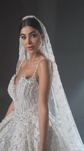 7.5K views · 116 reactions | .A luxurious wedding dress designed by Manal Ajaj, featuring intricate details and a feminine silhouette that enhances the bride’s beauty with an irresistible charm. @elias.issa_events.management @naif_haidar_ #bride #manalajaj #love #luxurylifestyle urious | Manal Ajaj | Facebook