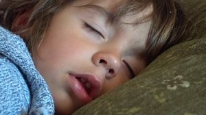 clip-26634946-4k-child-badly-coughing-his-sleep