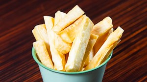 Cassava Fries Recipe by Chef Jeremy Lovell Yield - 6 Servings. Cook Time – Approx. 30 minutes. Prep Time: 10 minutes. Ingredients:  Cassava – 3lb (peeled, washed and cut into 4 inch long sticks) For Frying:  Vegetable Oil – 8 cups  Salt – to taste Method:  Add 10 cups of water to medium sized stock pot  Add 1 tbsp salt, cover and bring to a boil.  Once boiling, add cassava sticks and allow to cook for 5 minutes.  Add oil to large pot and allow to heat up to 350F.  Add cassava sticks and 