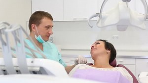Adult Dentist Smiling Patient Woman Sitting Stock Footage Video (100% Royalty-free) 1008074479 | Shutterstock