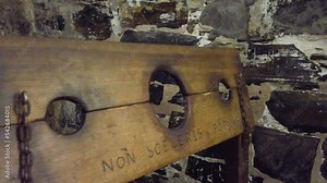Close Up Of Ancient Pillory In Punishment Chamber.