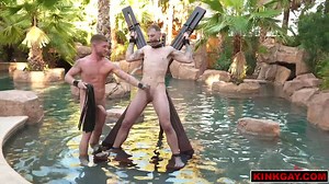 Josh Reaper is now bound in rope at the edge of the pool