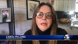 Carolyn Long congratulates Craig Cannon on retirement