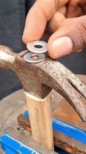 How to Fix a Loose Hammer Head Using a Metal Screw