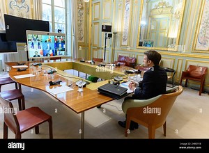 French President Emmanuel Macron takes part in a video-conference of G7 leaders on Ukraine at the Elysee Palace in Paris on February 24, 2022. Russia has launched an invasion of Ukraine in the early hours of February 24, 2022, defying Western outrage and global appeals not to launch a war. Photo by Jacques Witt/Pool/ABACAPRESS.COM Stock Photo - Alamy