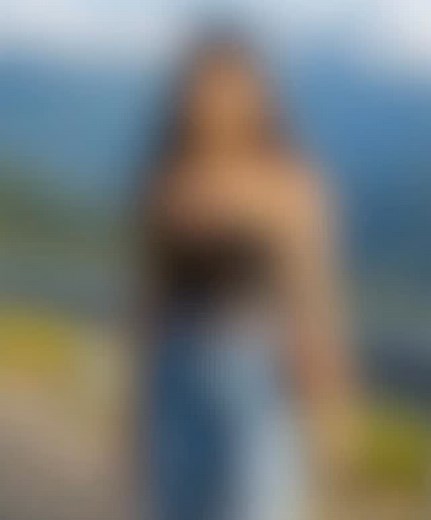 "#prompt A full-body shot of a young woman standing on a paved road next to a guardrail in a scenic mountainous area in banaoang ilocos sur. She is wearing a fitted black tube top, wide-leg distressed denim jeans with large rips, a brown belt, sunglasses,. and a small shoulder bag. Her long loose wavy dark brown hair, fashion photography style, outdoor lighting, vivid colors." Wearing a minimalist necklace.❤️❤️ | ashu_pal_6027
