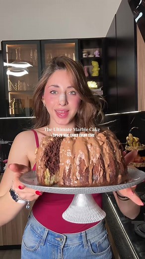 The only Marble Cake recipe you need كيك رخامي او كيك بالفانيلا و الشوكولا 🍫🍰 300 grams flour 2 tsp baking powder ½ tsp baking soda ½ tsp salt 1 cup oil 1 ¾ cups sugar 4 eggs 1 tbsp vanilla extract 1 cup milk or buttermilk For the chocolate layer 3 tbsp cocoa powder 3 tbsp milk or coffee