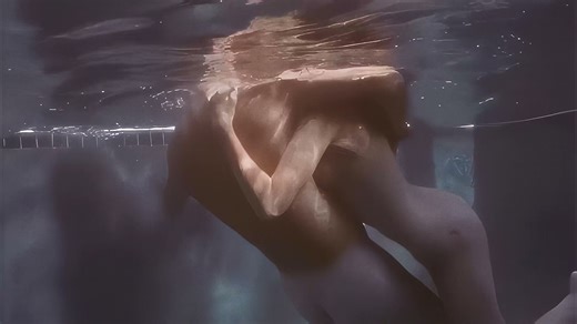 SHE PULLS HIS SWIMMING TRUNKS OFF