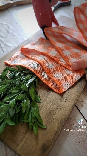 Adorable DIY carrot made with ribbon and greenery 🥕🐰 #easterdecor #easterinspo #easterinspiration #springdecor #carrot #carrotdecor #springvibes #Easter #diy #craftersoffacebook #craftlife #createandinspire #easterideas #springideas | Love Crafted Decor