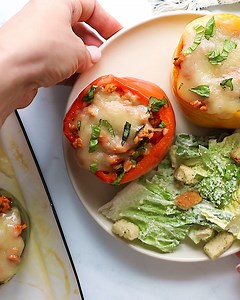These delicious turkey stuffed peppers are filled with a tasty combination of lean ground turkey, healthy brown rice, tomato sauce, seasonings and melty cheese! Recipe 👉 https://www.healthyseasonalrecipes.com/ground-turkey-stuffed-peppers/ | Healthy Seasonal Recipes