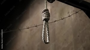 hanging gibbet and barbed wire in concentration camp