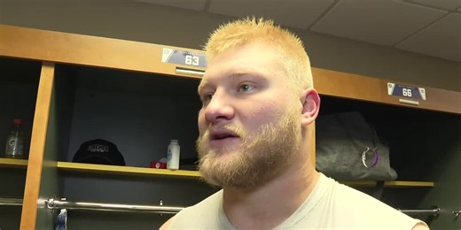 NFL lineman brings reading ‘front and center’ for kids in special return home