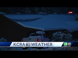 Drivers continue to travel I-80 in snowy conditions