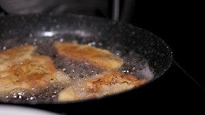 The Mekitsa is Frying in a Hot Pan with Oil, Turning To the Other Side. Stock Video - Video of bulgarian, alone: 430905927