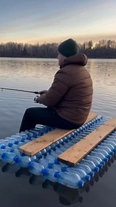 The video shows me fishing from a homemade boat constructed entirely from plastic bottles. The improvised vessel floats steadily as I cast my line into the water. Despite its unusual design, it functions surprisingly well. A creative approach to building a boat from recycled materials. This text and video are entirely fictional and created using artificial intelligence. | Anatolii Marynyuk