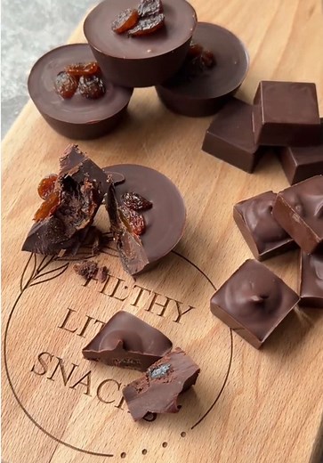 Rum and raisin chocolate tarts, truffles and filled squares. A firm Ganache is always 2:1 choc to cream ration. Always add wet ingredients after ganache is made otherwise your chocolate will seize.