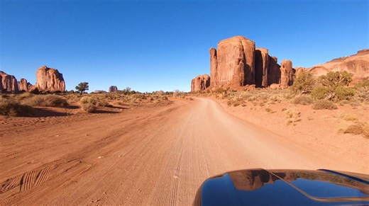 Monument Valley. Monument Valley is an iconic, sacred Navajo Tribal Park on the Arizona-Utah border known for its towering sandstone buttes and spires. A famous backdrop for Western films, it offers guided tours, horseback rides, and scenic drives, providing a blend of stunning desert landscapes and a connection to Navajo culture. Please note all photos, videos and reels on this page were taken by myself and my wife on our road trips in the USA and Canada. | Just Drive America