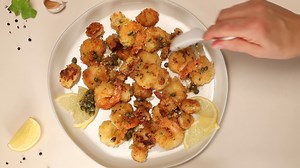 Shrimp, scallops, and calamari in a delicious caper butter sauce...this Seafood Fritto Misto recipe is a perfect addition to your holiday menu! https://bit.ly/3dKCvHJ | ShopRite