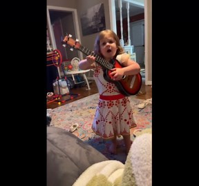 Little girl performs 'You Are My Sunshine' with heartfelt emotion and joy