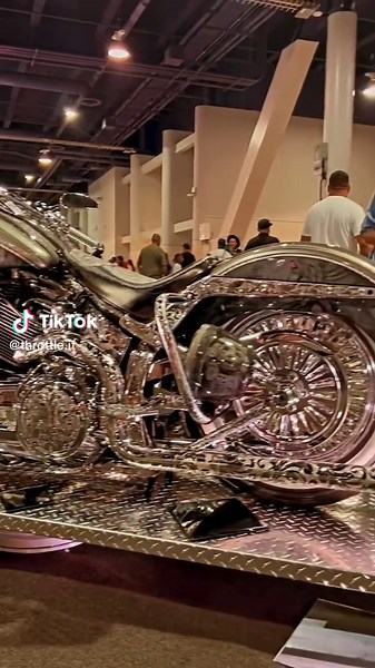 Custom Chopper Showcase: A Detailed Motorcycle At Event