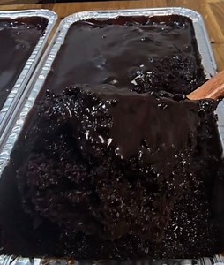 RICH AND FUDGY CHOCOLATE CAKE These Moist Chocolate Loaf Cakes with chocolate ganache are rich, indulgent, and easy to serve—perfect for any occasion! A Slice of Perfection and a Chocolate Lovers Dream Ingredients For the Cake: 2 cups all-purpose flour 1 1/2 cups white sugar 1/2 cup brown sugar 1/2 tsp salt 1 1/2 tsp baking powder 2 tsp baking soda 3/4 cup unsweetened cocoa powder 2 large eggs 1/2 cup vegetable oil 1 cup buttermilk 1 1/2 tsp vanilla extract 1 tsp instant coffee 1 cup hot water F