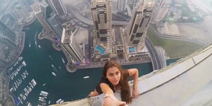 Russian model branded 'reckless' for deliberately dangling from Dubai skyscraper for photoshoot