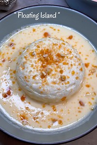10K views · 30 reactions | Light, elegant, and effortlessly festive ✨ This Floating Island dessert features soft, cloud-like meringue gently resting on silky vanilla custard, finished with a delicate caramel drizzle. A classic French treat that’s perfect for Christmas — indulgent yet light, making it a beautiful ending to a festive meal. #floatingisland #meringue #meringuedessert #îleflottante #frenchdessert #christmasfood | Passion2cook | Facebook