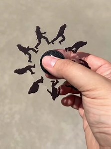 Fidget spinner appears to be animated.