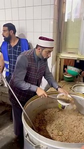 Sayyed Shaykh Hashim Al Gailani distributing food to the poor at the Mosque of Shaykh Abdul Qadir al-Gailani, Baghdad, Iraq. (11 Rabi Al Thani) | Shaykh Hashim Al-Gaylani