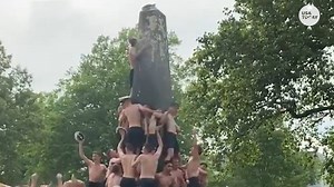 US Naval freshmen complete the traditional Herndon Monument Climb