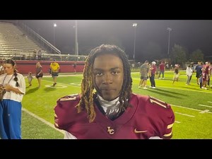 Lincoln Christian RBs CJ Wright and Braeden Baker, coach Jerry Ricke after 62-0 win over Holland