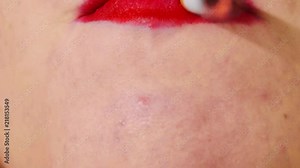 Extreme Close Up, Woman with red lips lighting and smoking a cigarette