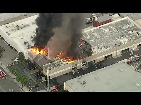 Firefighters battle large fire at Signal Hill commercial building