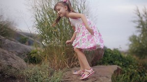 Little Girl in a Summer Dress Climbing a Mountain of Stones Stock Video - Video of carpathians, nature: 85050765