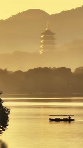 A picturesque scene reflecting the aesthetic charm of the Chinese landscape. 🏞️✨ 🎥: xiaohongshu-杭小白（摄影版） 📍The West Lake, #Hangzhou, #Zhejiang #ScenicViews #GoldenHour #TravelGoals #PhotographyParadise | Fantastic China