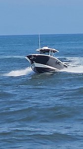 Beautiful Blackfin Center Console Heads Back Through The Inlet | Domino Dackclear