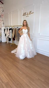 Tag a bride who would look stunning in this dress! 😍 Comes with detachable long sleeves. Shop all of our budget-friendly bridal styles by tapping on our “For The Bride” tab on shopbellaandbloom.com! | Bella & Bloom Boutique