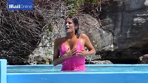 Busty Cheyenne Tozzi in pink dress for poolside photo shoot