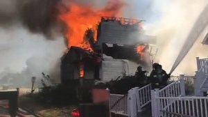 VIDEO: House collapses while crews fight large fire in north St. Louis