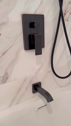 Porcelain tile mixed with a deep soaking tub. #Tile #remodel #construction #bathroom #hardwork #diy | Seth Riley