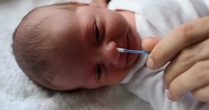 Gentle Care: Cleaning Newborn Baby's Nose Stock Footage SBV-348430608 - Storyblocks