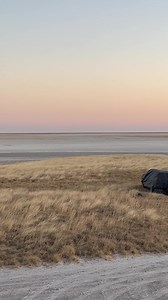 The sun starts to set over the pans as the OPPIPANNE festival gets set up | The Buffalo Overlander